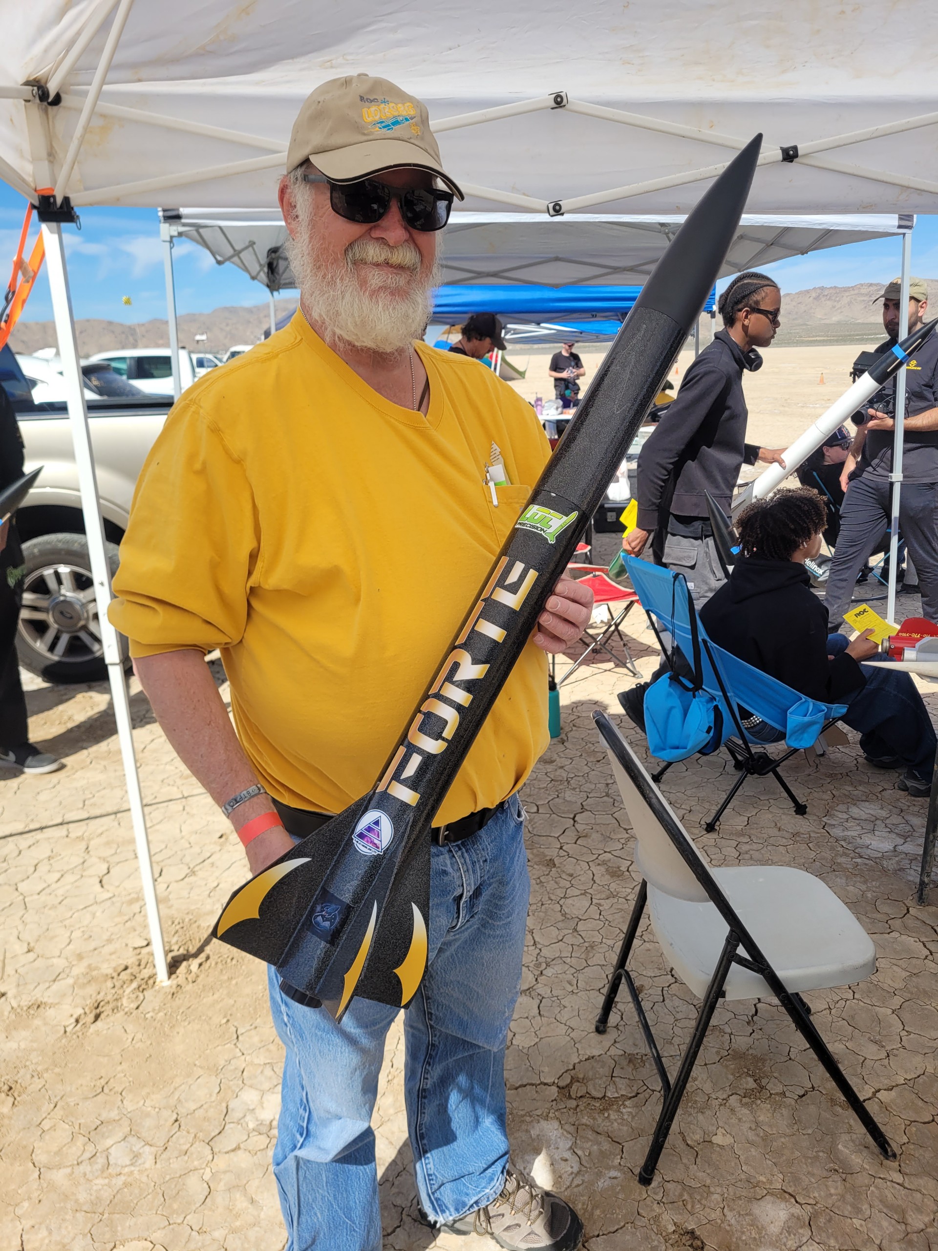 Man holding rocket model